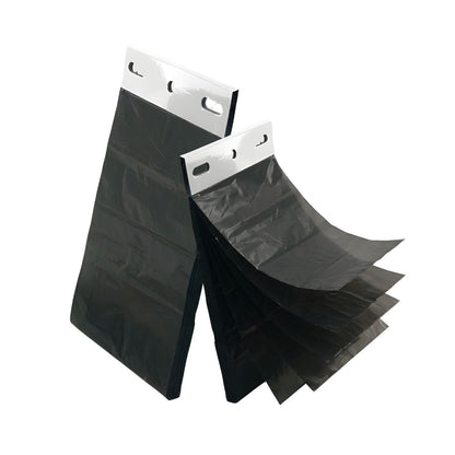 Black header waste bags fanned out, each with a white punched header strip.